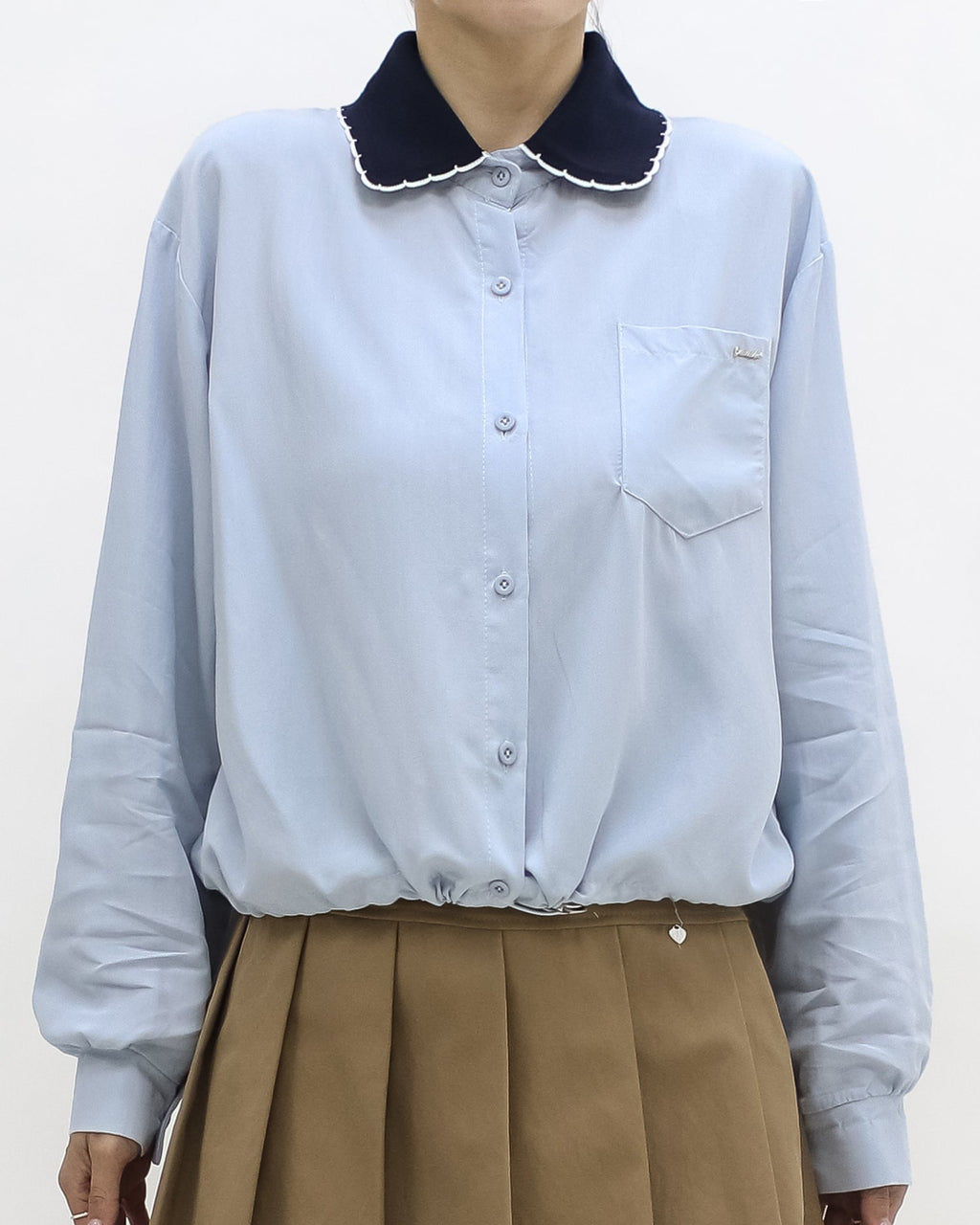 blue shirt w/ navy knitted collar