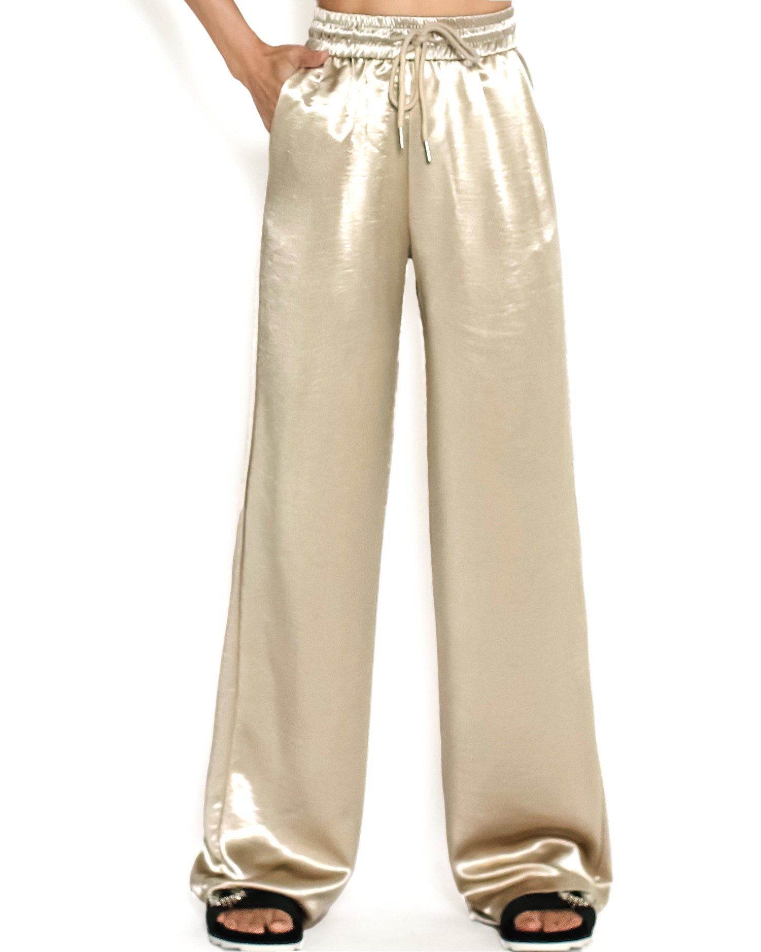 beige shiny straight leg pants