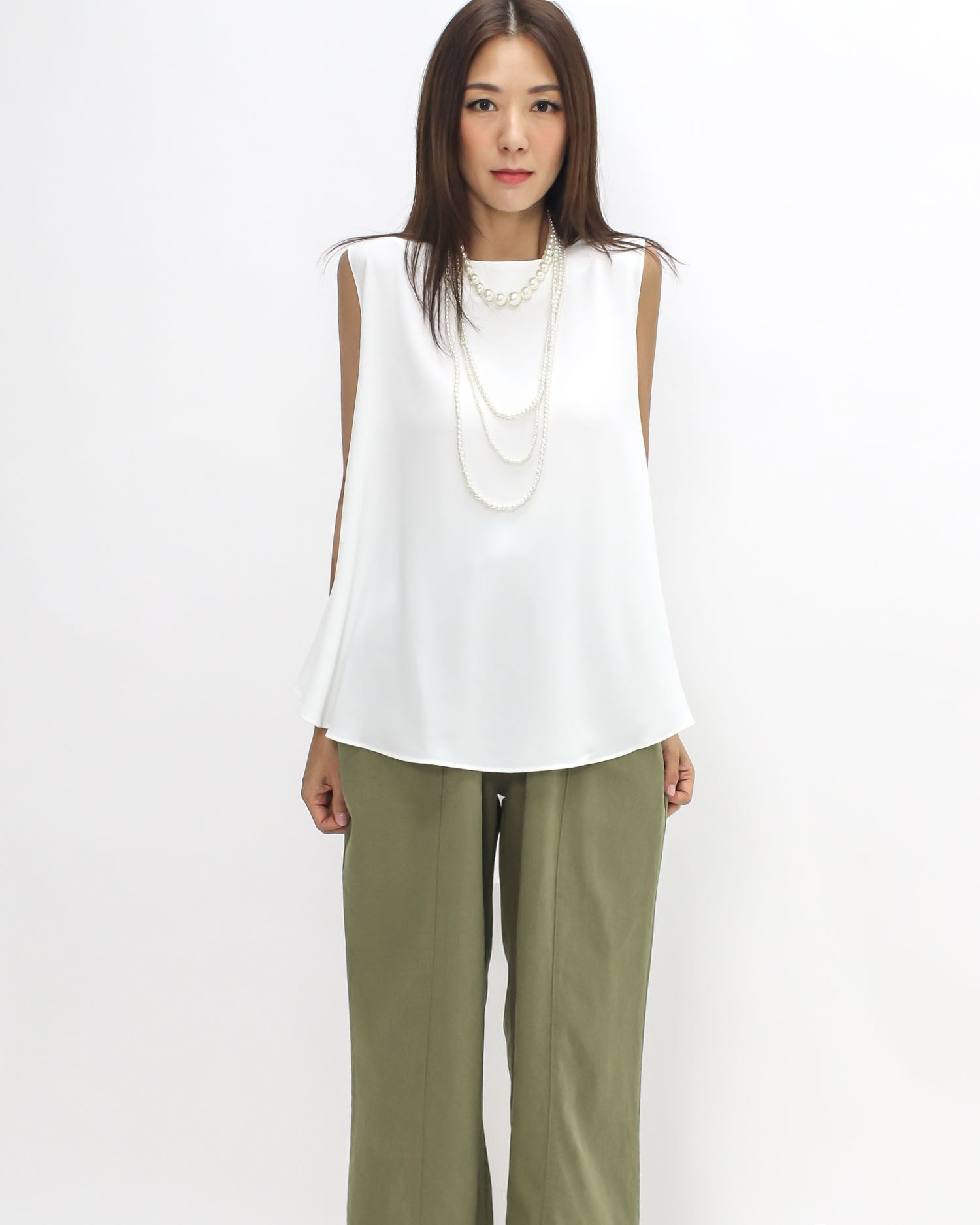 Ivory slinky flare vest