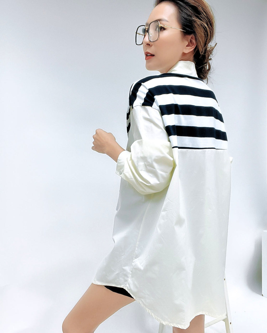 black frame with gold amrs clear lens glasses