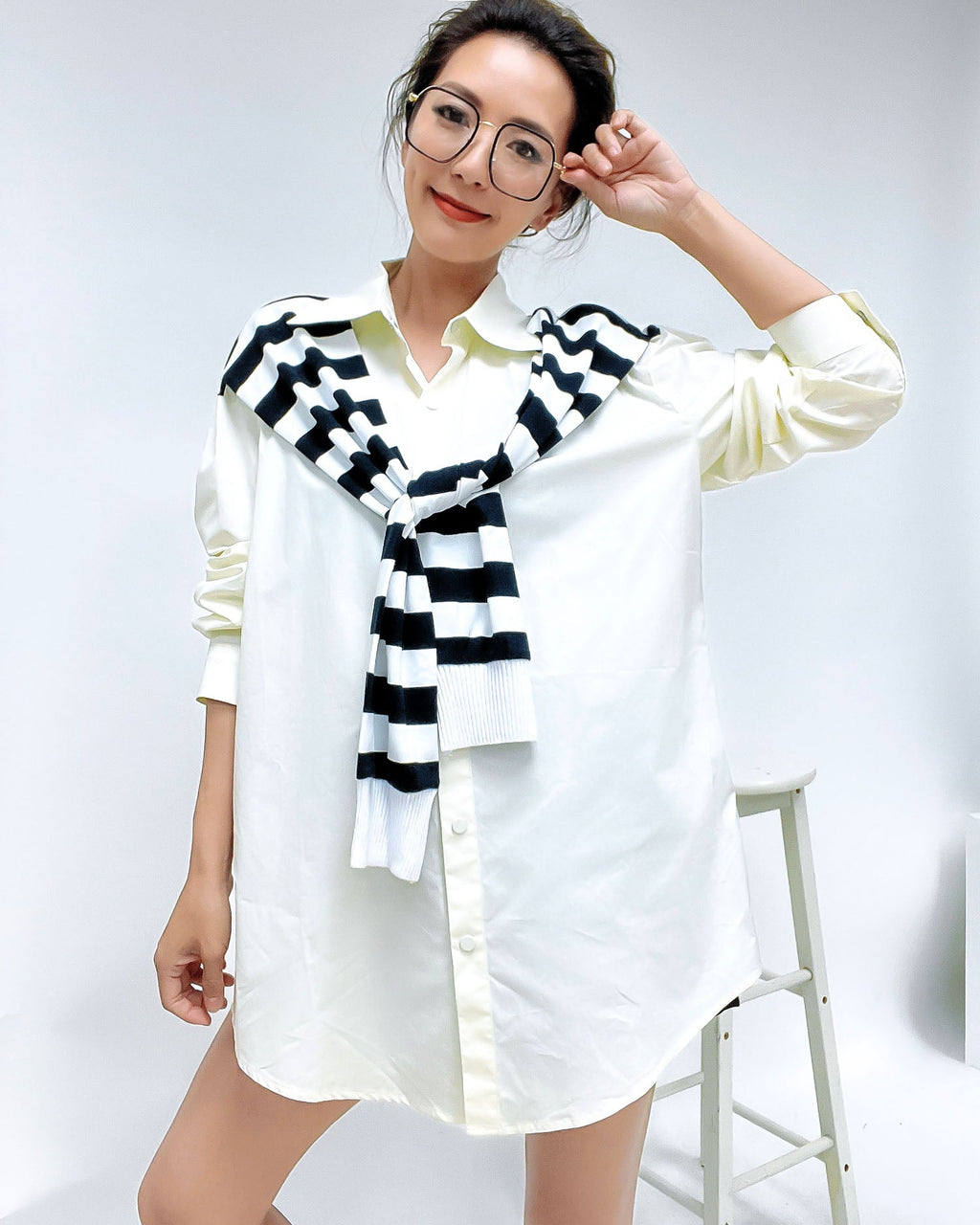 black frame with gold amrs clear lens glasses